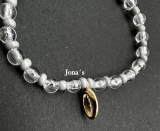 Armband Muschel grau